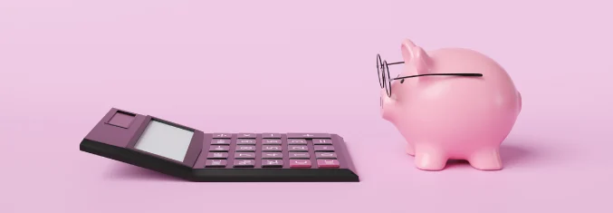 A pink piggy bank wearing glasses looking at a calculator